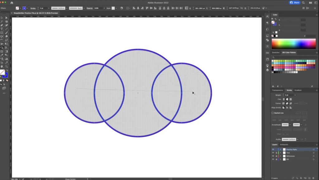 Clicking and dragging across the shapes needed to merge in Adobe Illustrator.