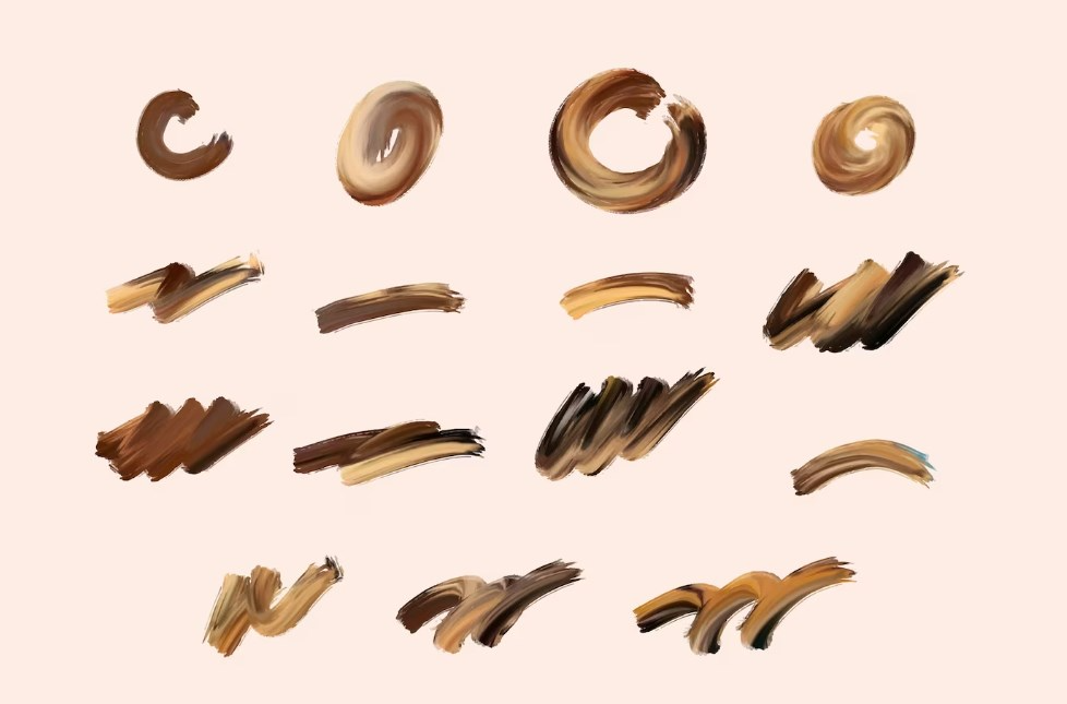 a collection of hand-painted brown acrylic brush strokes 