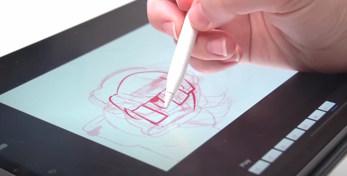Photo of a hand sketching on an iPad using the Procreate